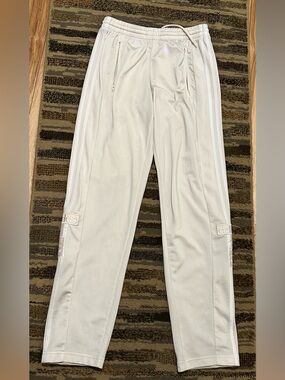 ADIDAS women’s Cream/White Track Pants with Side Stripes and Zip Pockets